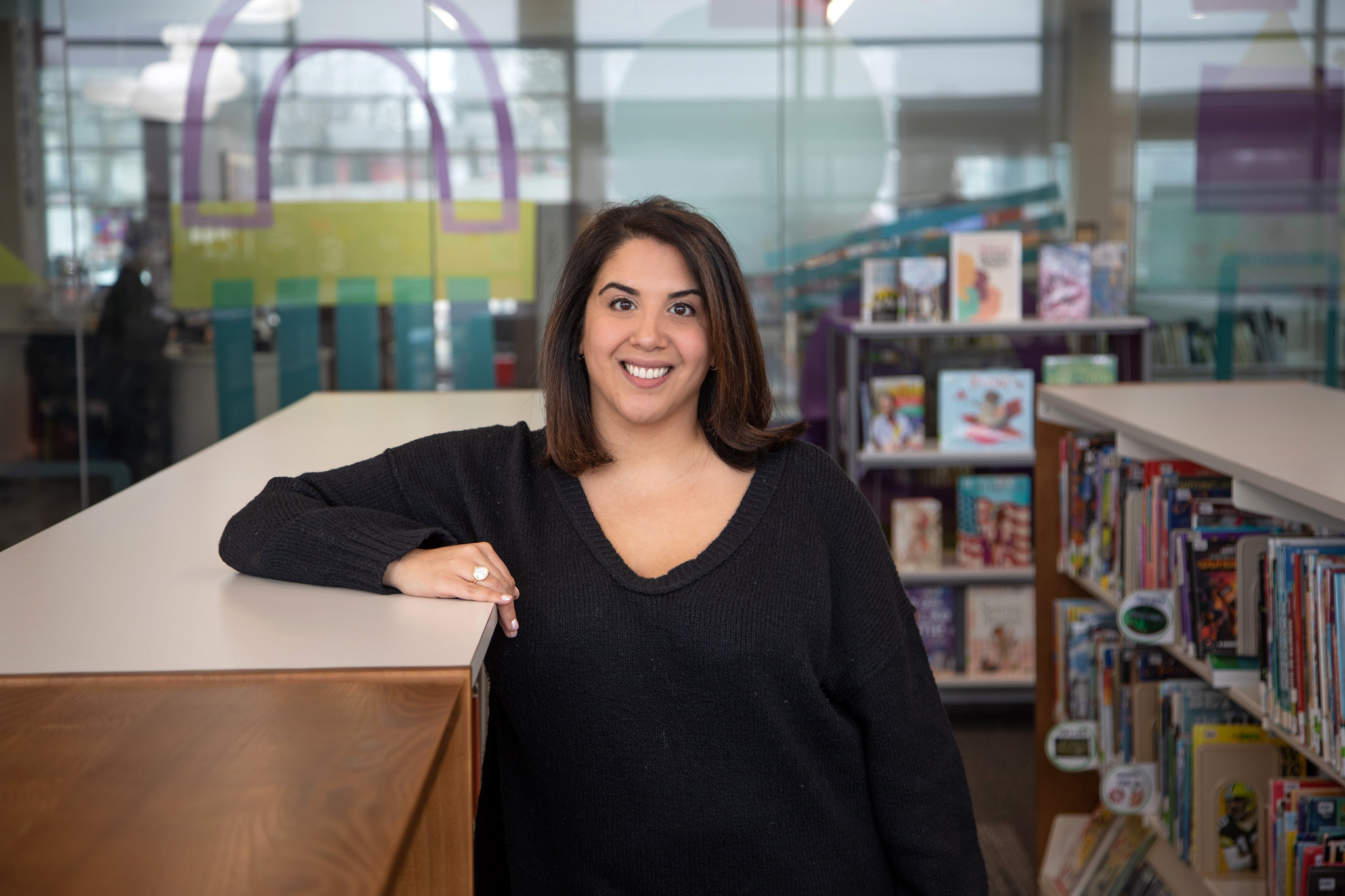 Madison Public Library Foundation Epilogue Circle Donor Tanya Salman standing in Pinney Library